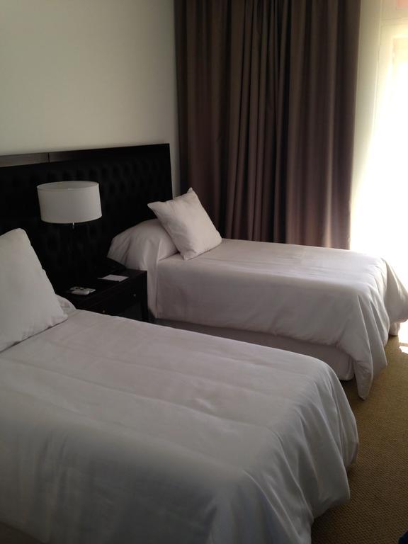 Real Hotel Lujan Bagian luar foto