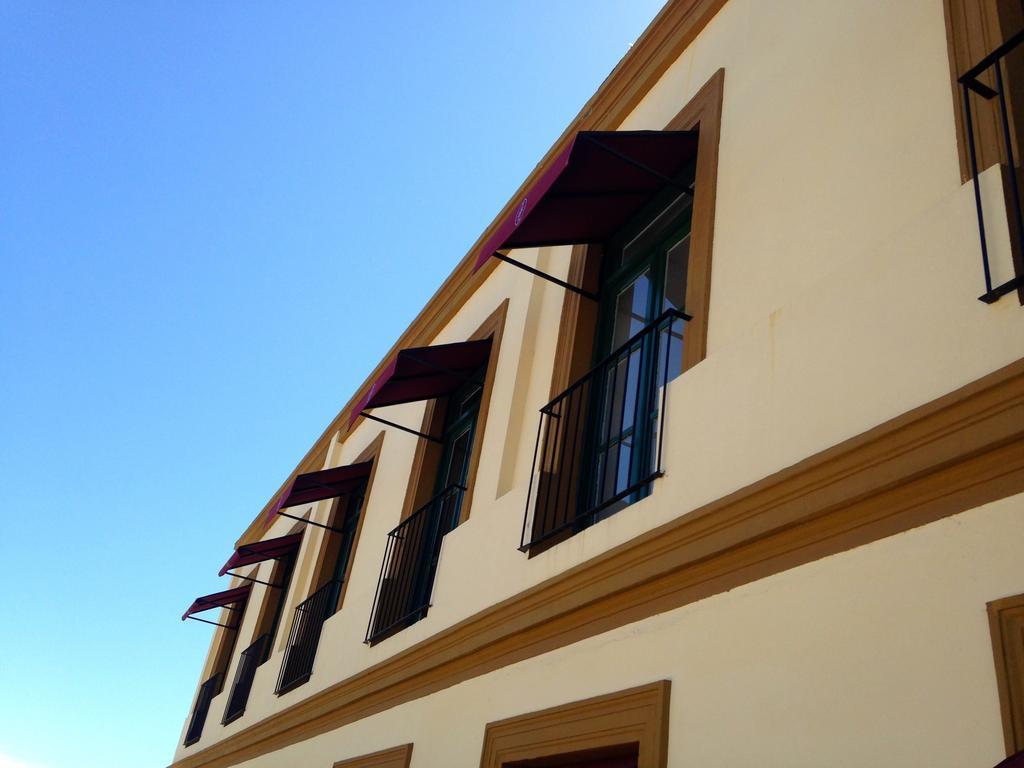 Real Hotel Lujan Bagian luar foto