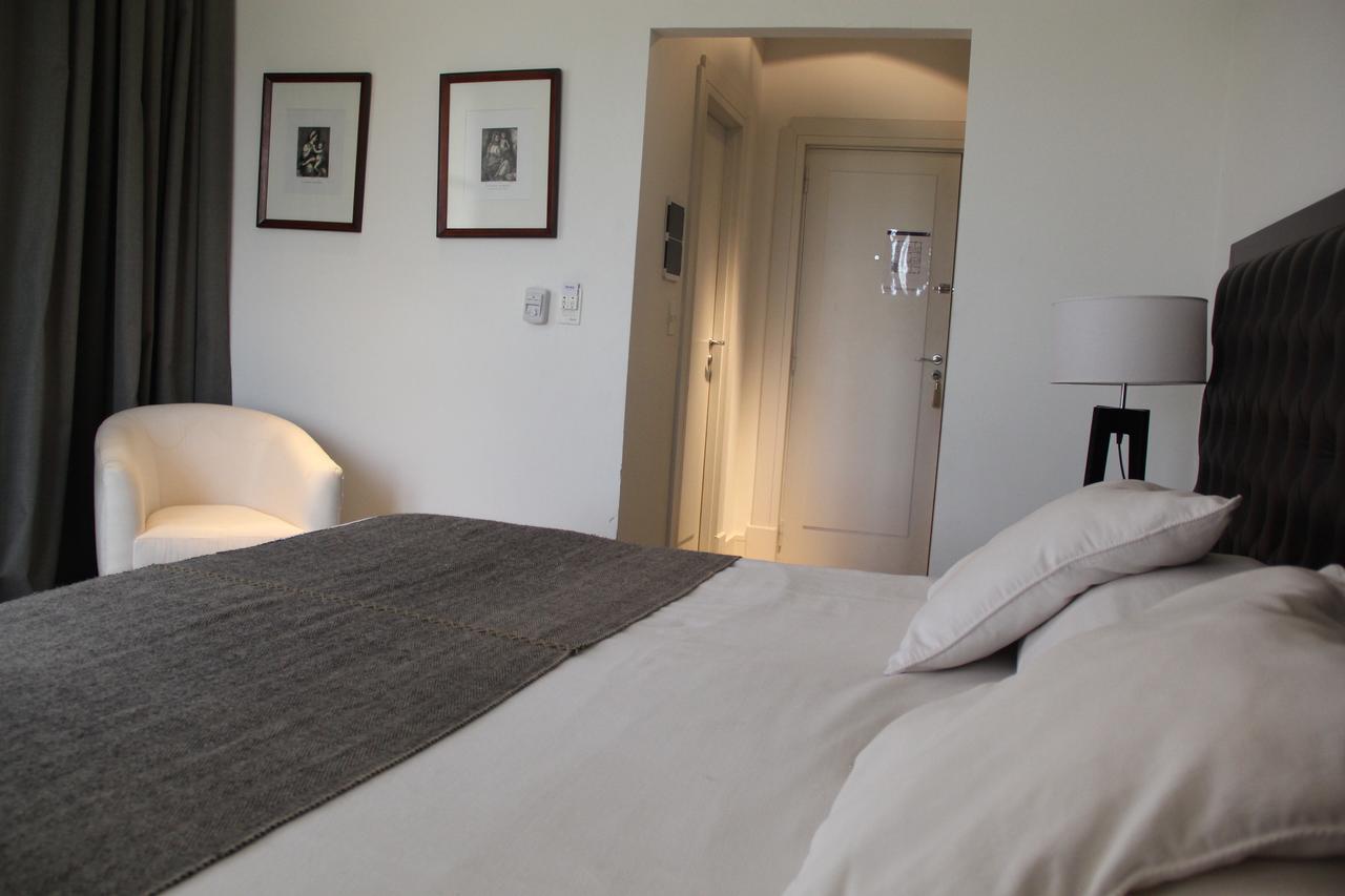 Real Hotel Lujan Bagian luar foto