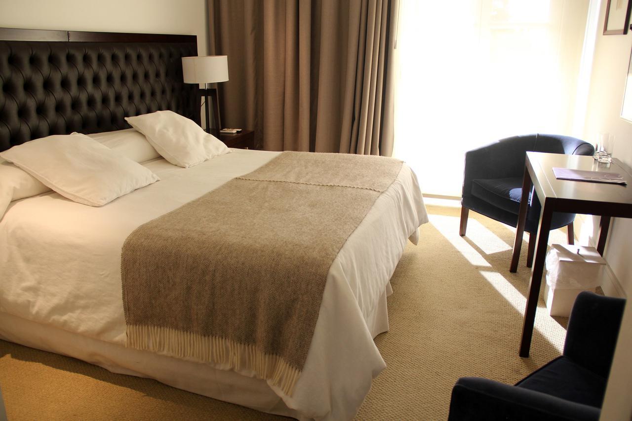 Real Hotel Lujan Bagian luar foto