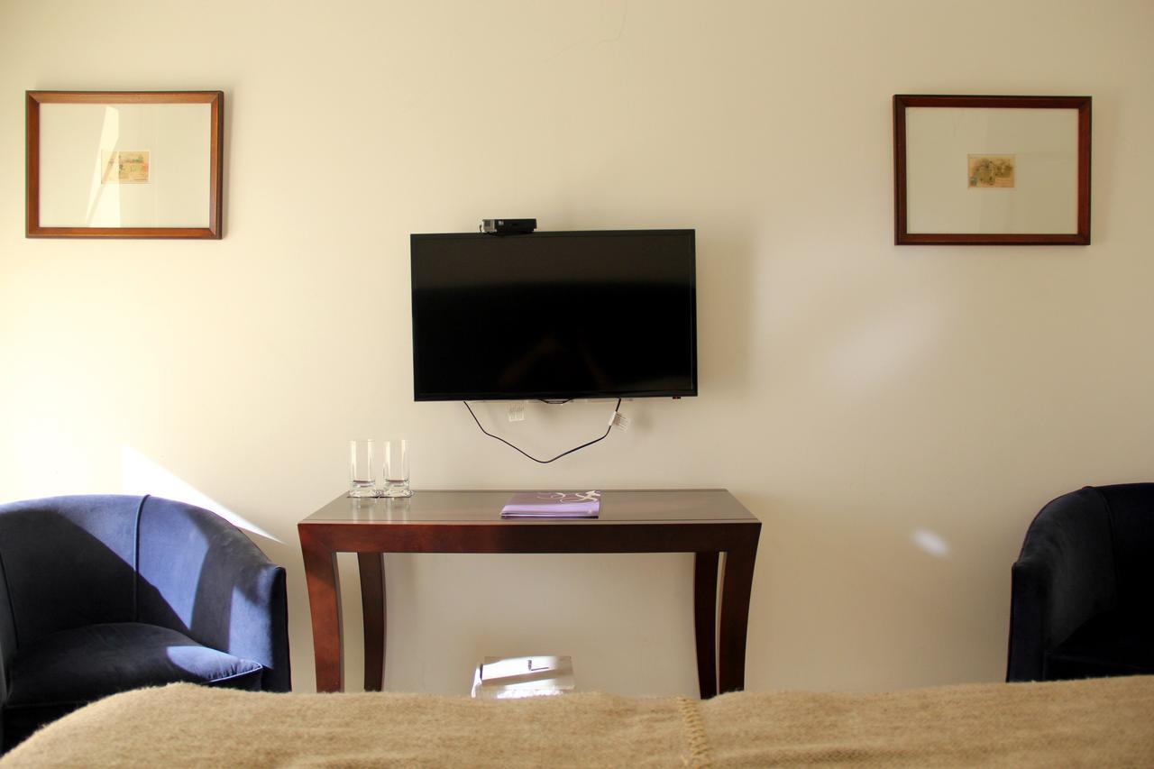 Real Hotel Lujan Bagian luar foto
