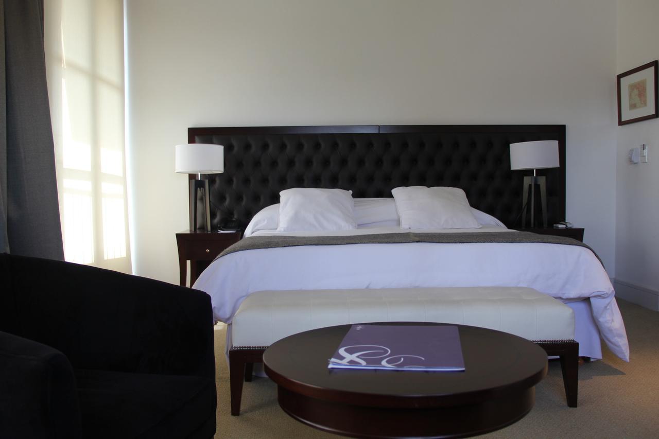 Real Hotel Lujan Bagian luar foto
