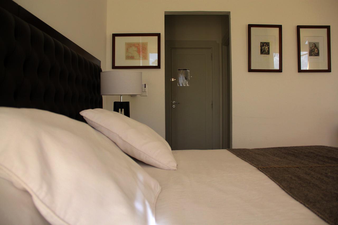Real Hotel Lujan Bagian luar foto