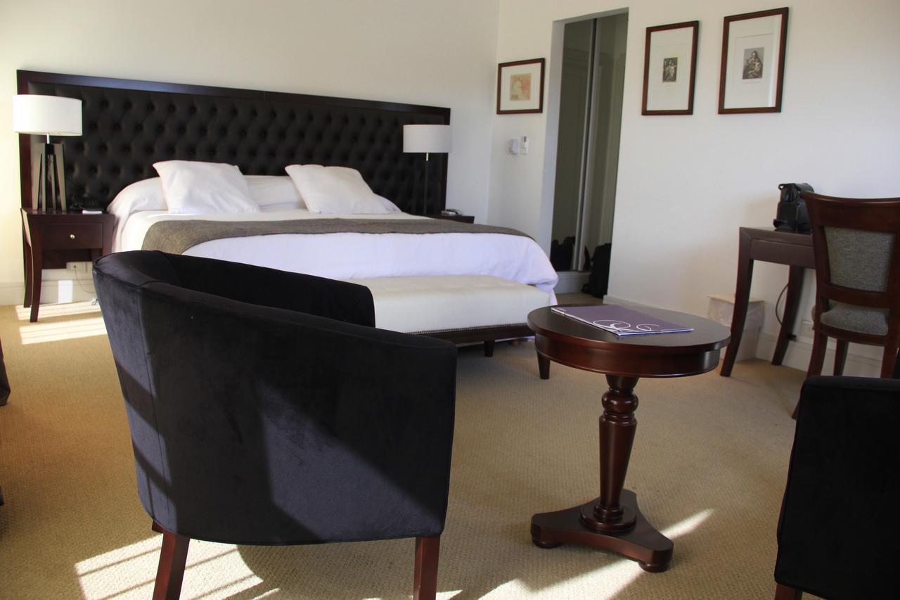 Real Hotel Lujan Bagian luar foto