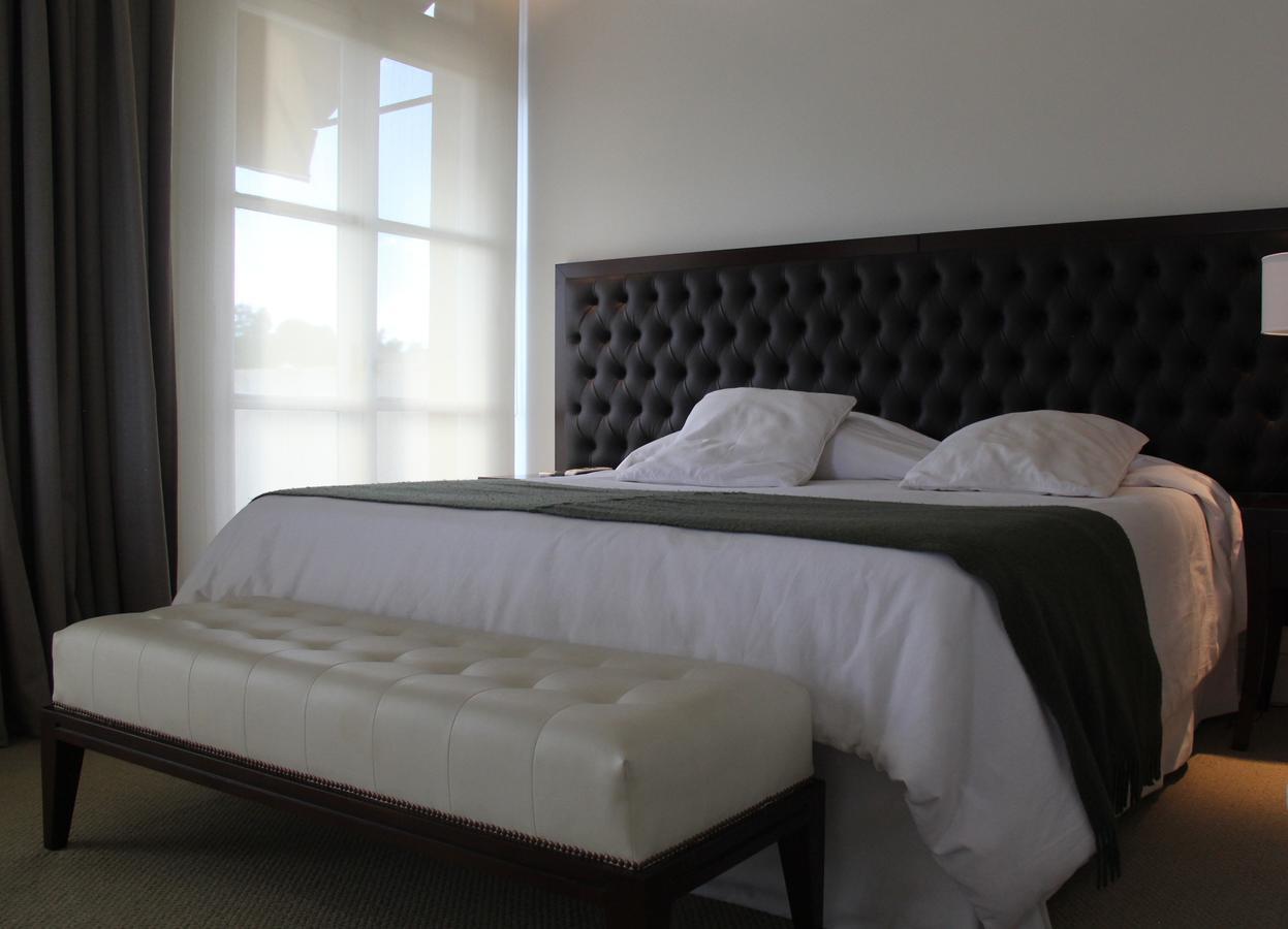 Real Hotel Lujan Bagian luar foto