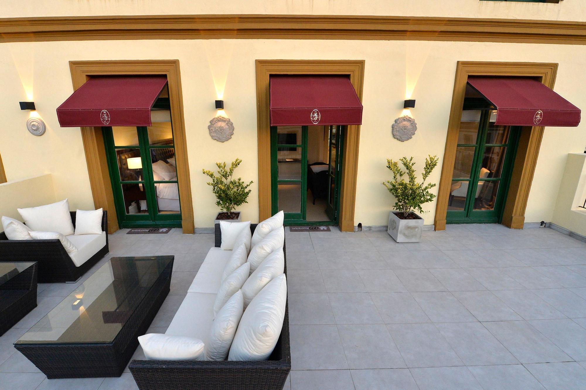 Real Hotel Lujan Bagian luar foto